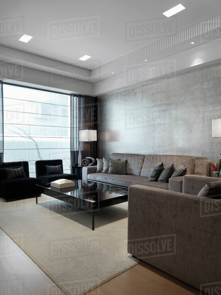 Modern living room with gray furnishings Stock Photo Dissolve