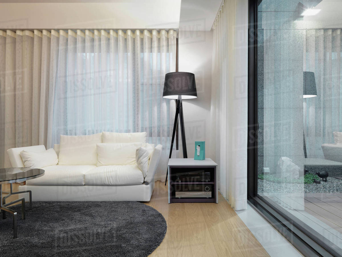 White love seat in modern living room Stock Photo Dissolve