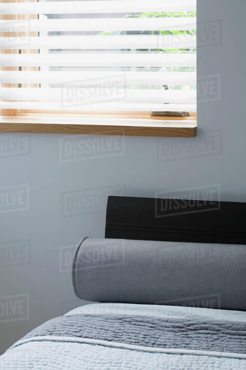 Bolster Pillow On Bed Stock Photo Dissolve