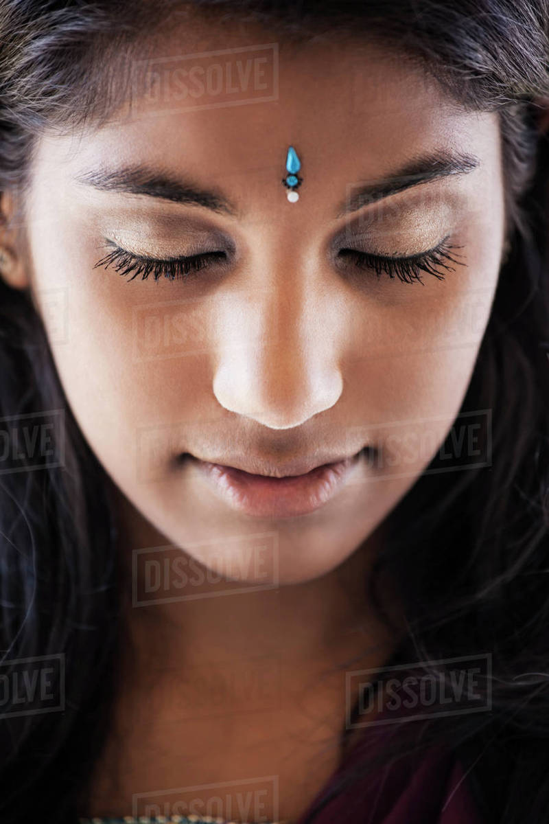 Indian Woman With Jewel On Forehead Stock Photo Dissolve Indian Woman With Jewel On Forehead