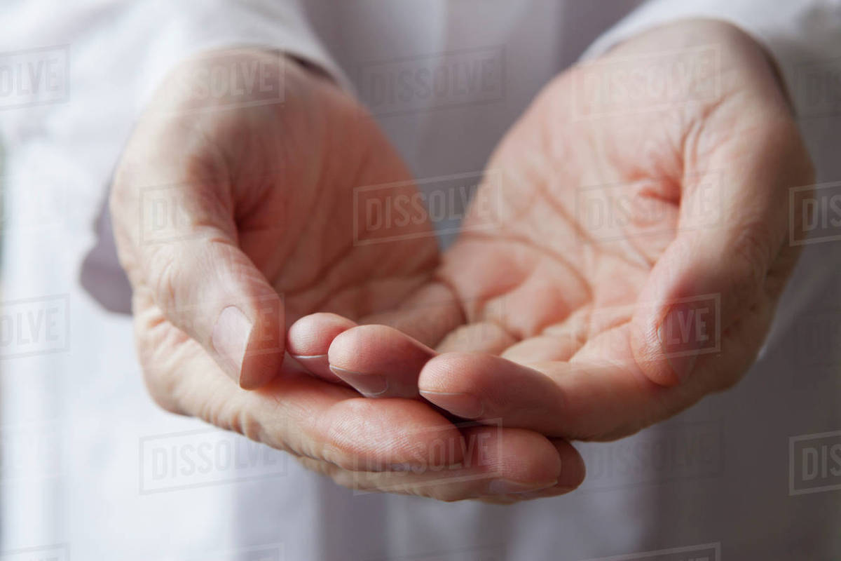 cupped hands of hispanic