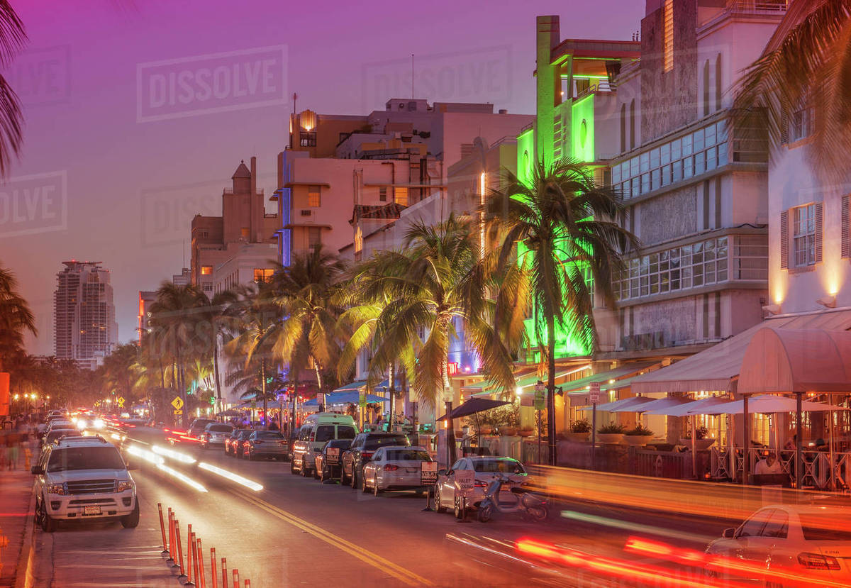 Cars Driving In Street At Night Miami Beach Florida United States Cars Driving In Street At Night Miami Beach Florida United States