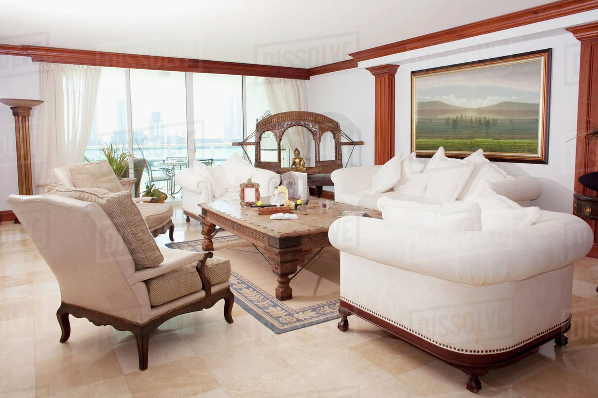 Sofas Armchairs And Coffee Table In Ornate Living Room Stock Sofas Armchairs And Coffee Table In Ornate Living Room