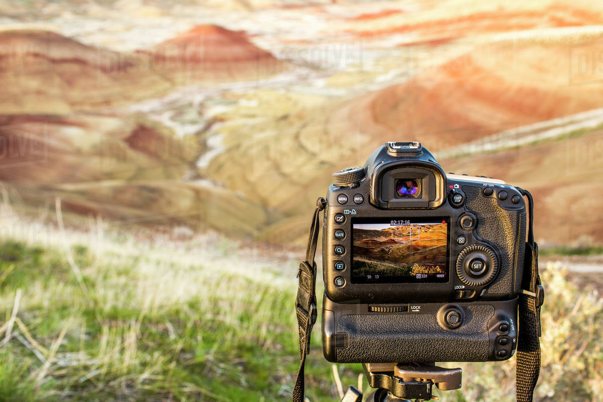 Camera photographing desert landscape, Painted Hills, Oregon, United
