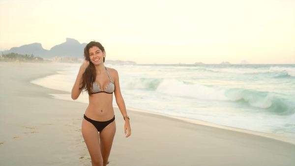 Young Brazilian Women On A Beach In Brazil Stock Video Footage Beautiful Young Brazilian Woman Smiles On A Beach In Brazil Royalty Free Stock Video