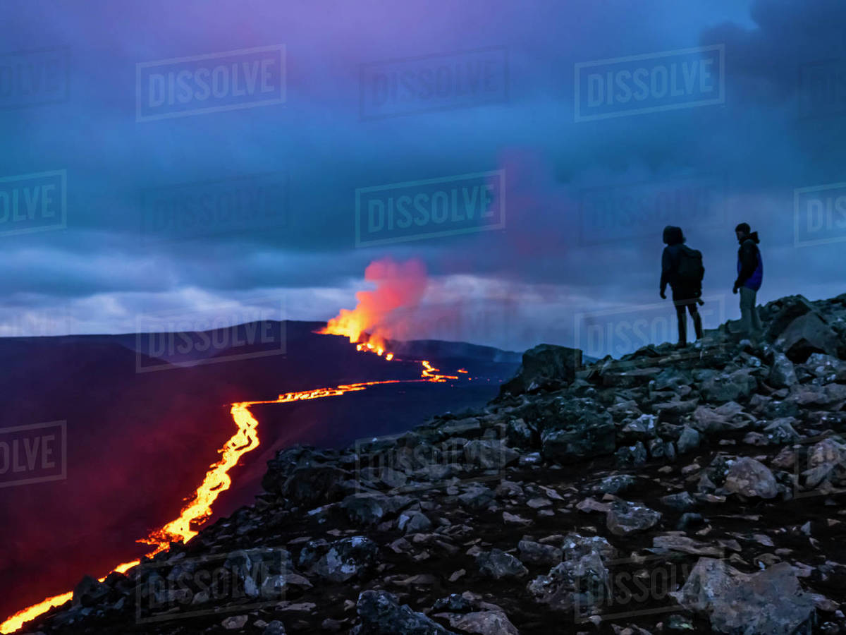 Hikers View Glowing River Of Magma And Lava Cascades Fagradalsfjall Volcanic Eruption At Geldingadalir Iceland Stock Photo Dissolve