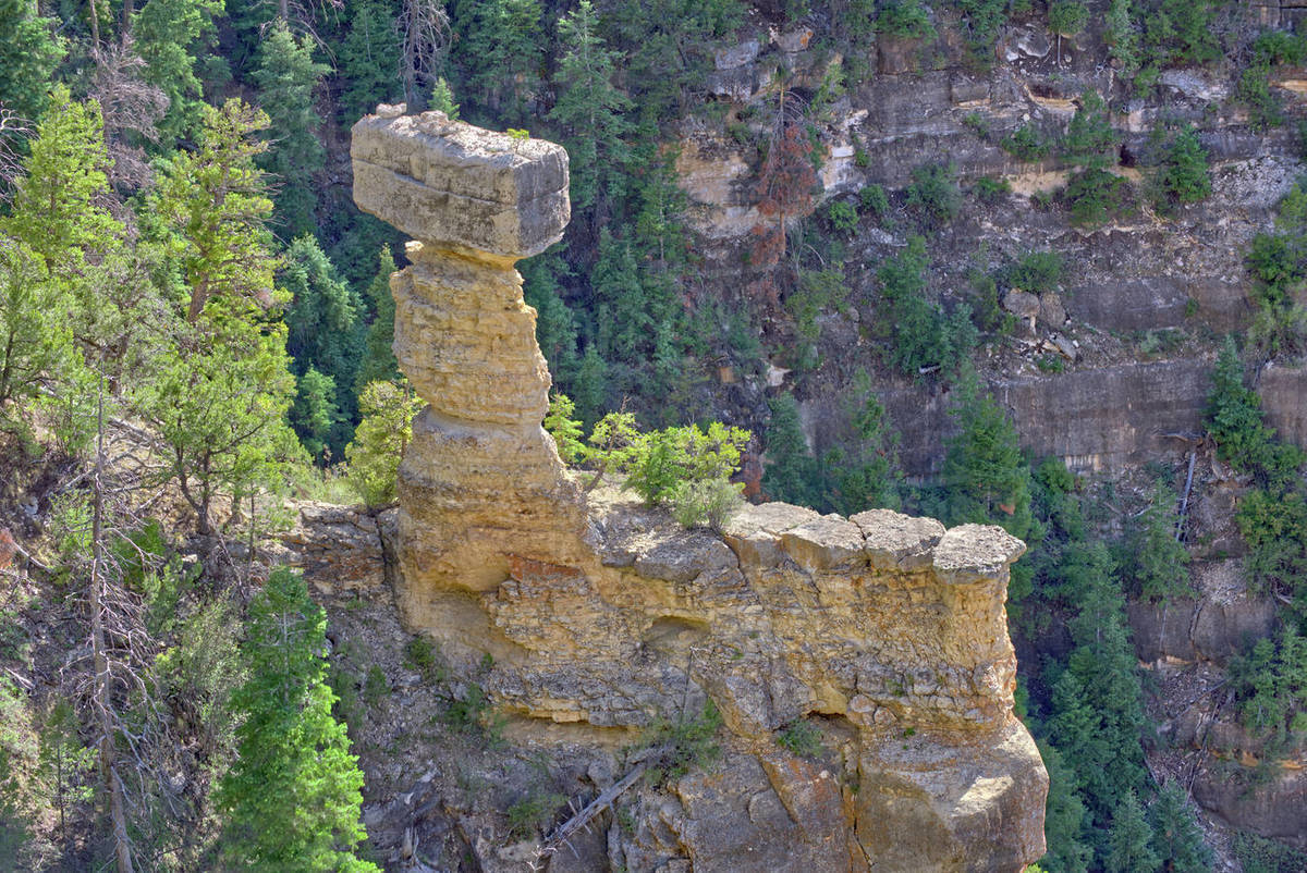 Closeup of a rock formation at Grand Canyon Arizona called Thor's Hammer. Stock Photo Dissolve