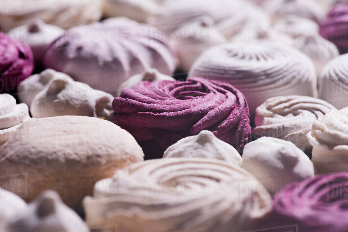 Close up view of different marshmallows and zephyr Stock Photo Dissolve