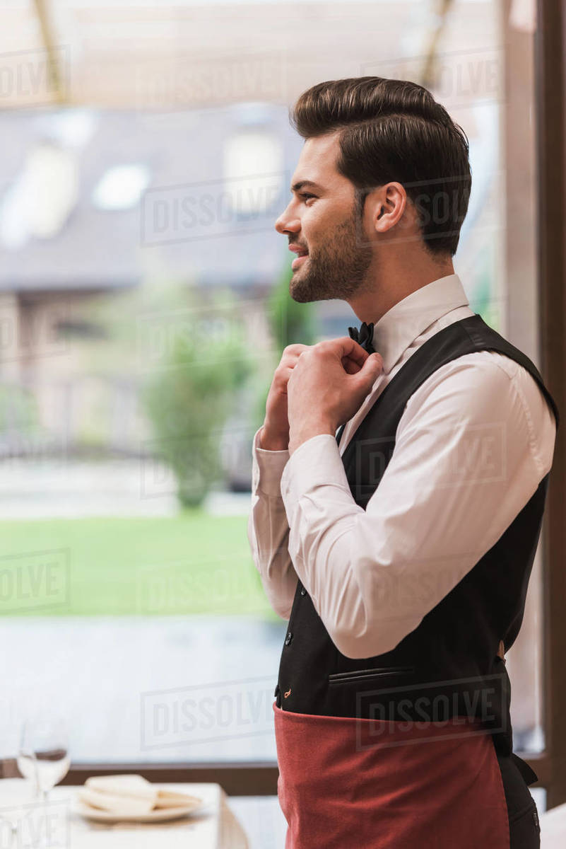 waiter with bow tie