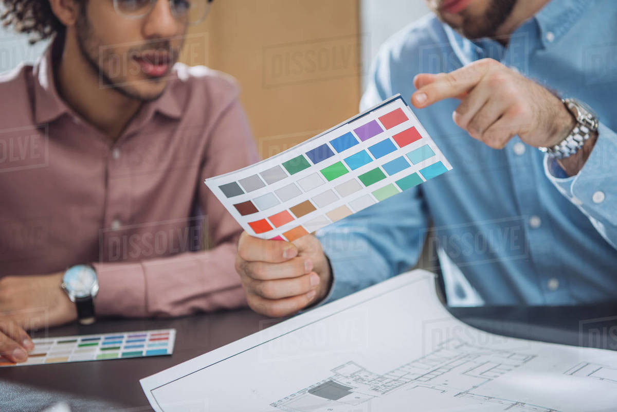 Cropped shot of designers choosing colors from palette for project Royalty-free stock photo