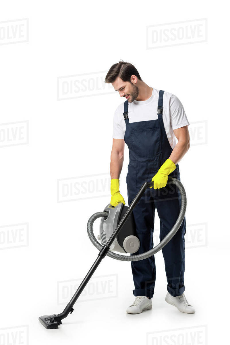 Cleaner in uniform and rubber gloves with vacuum cleaner isolated on