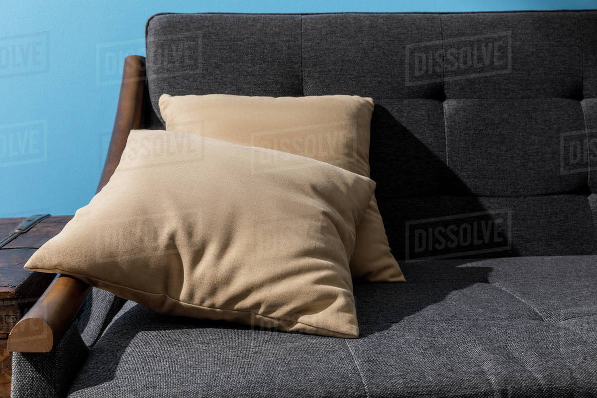Close Up Shot Of Pillows Lying On Comfy Couch Stock Photo Dissolve