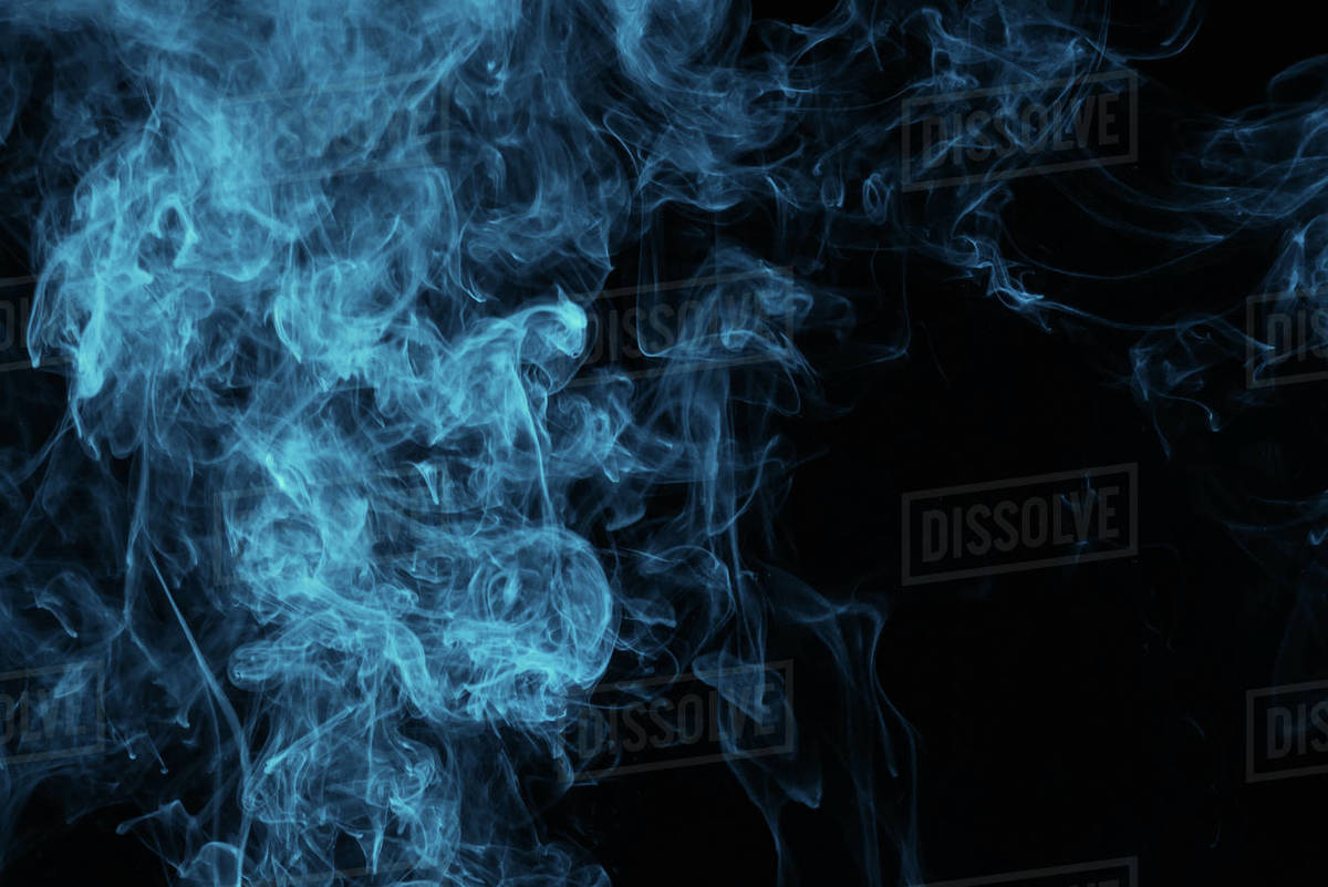 Blue steam on black background with copy space Stock Photo Dissolve