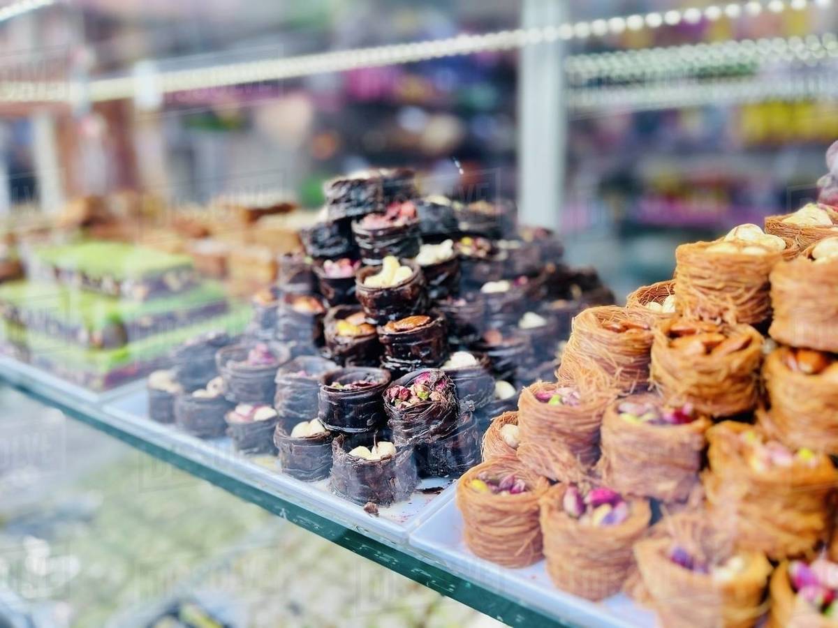 View through a shop window of traditional assorted desserts, Sarajevo