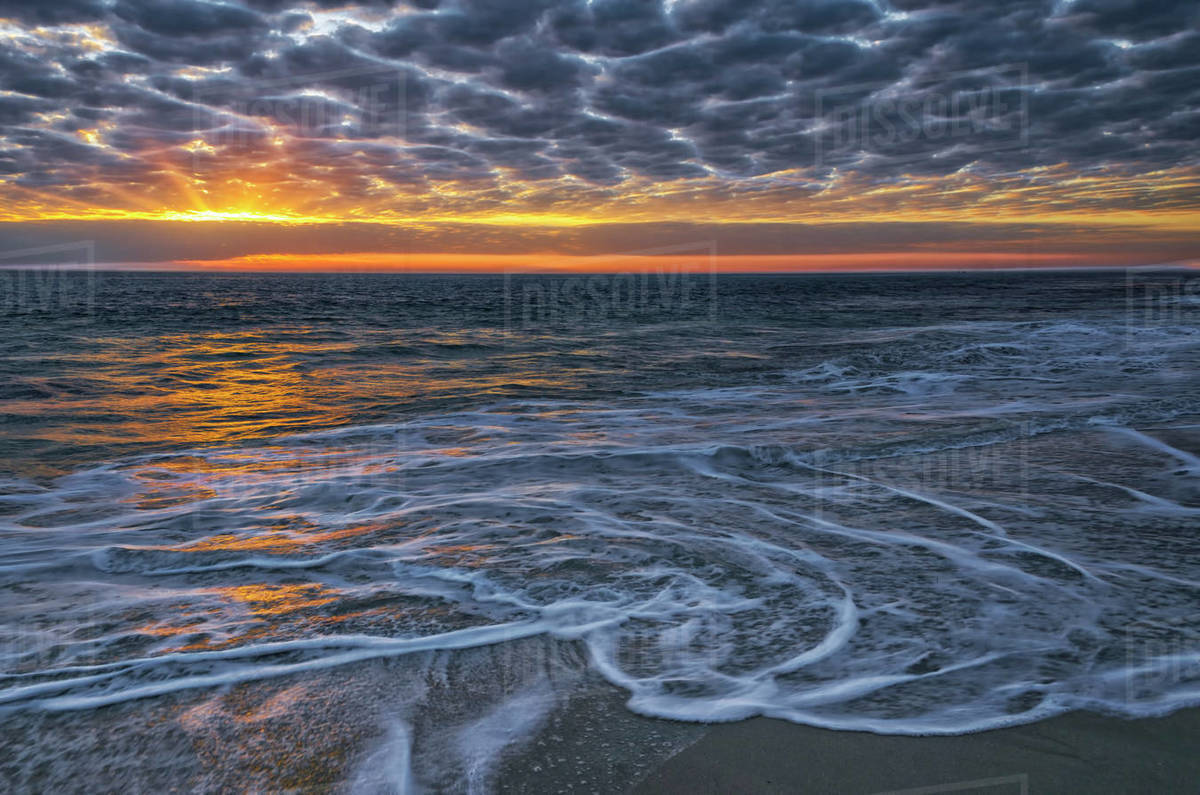 Beach at sunset, Perth, Western Australia, Australia Stock Photo Dissolve