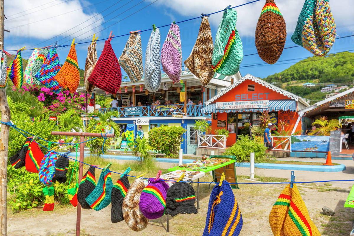 Colourful shops in Port Elizabeth, Admiralty Bay, Bequia, The Grenadines, St. Vincent and the Grenadines, Windward Islands, West Indies, Caribbean, Central America Royalty-free stock photo