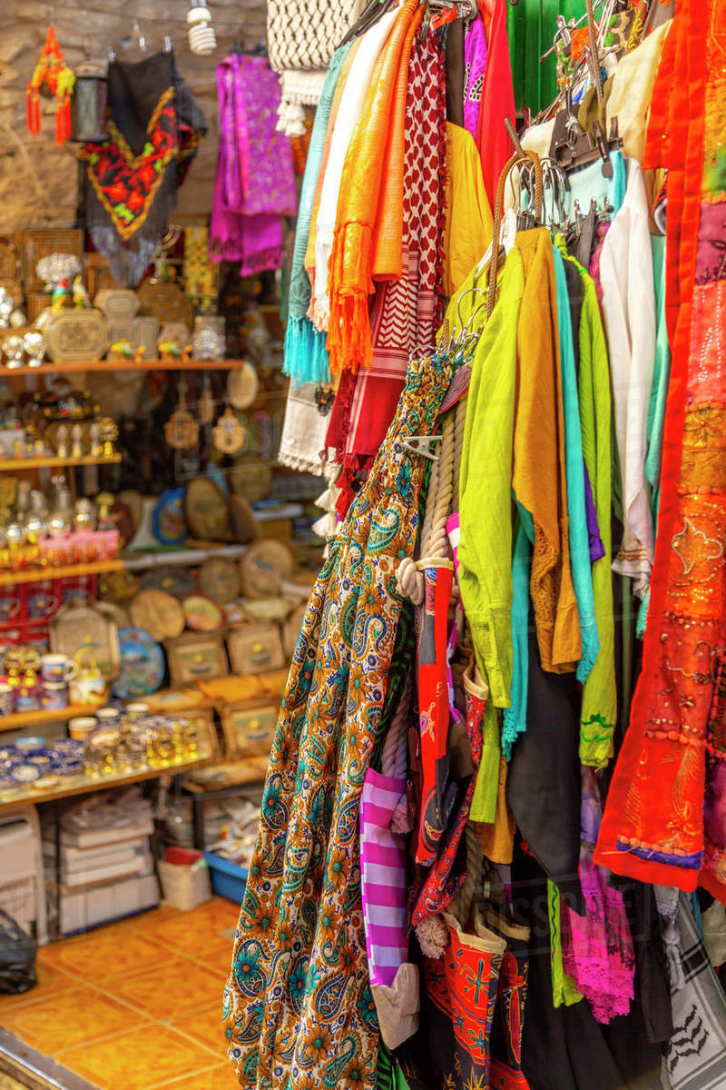 Colourful garments, Souk Khan al-Zeit Street in Old City, Old City, UNESCO World Heritage Site, Jerusalem, Israel, Middle East Royalty-free stock photo