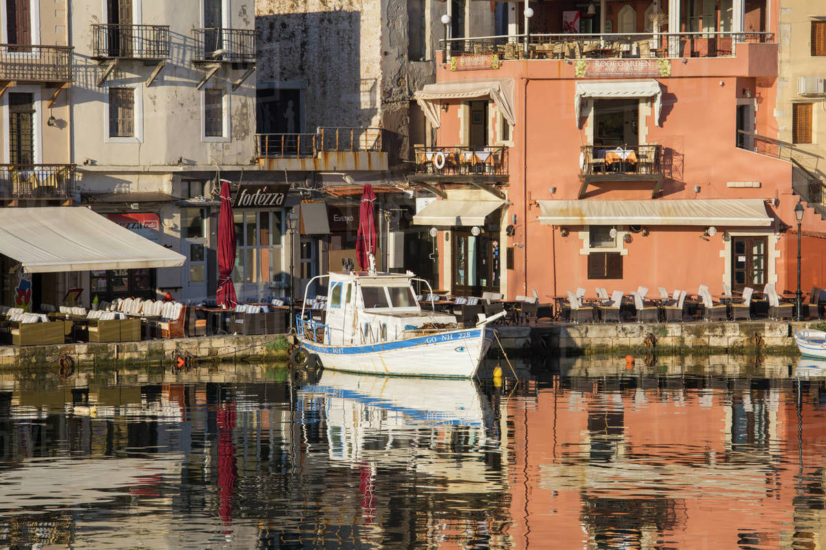 Colourful reflections in the Venetian Harbour, early morning, Rethymno (Rethymnon), Crete, Greek Islands, Greece, Europe Royalty-free stock photo