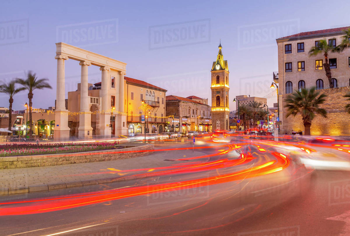 View of The Clock Tower and trail lights at dusk, Jaffa Old Town, Tel Aviv, Israel, Middle East Royalty-free stock photo