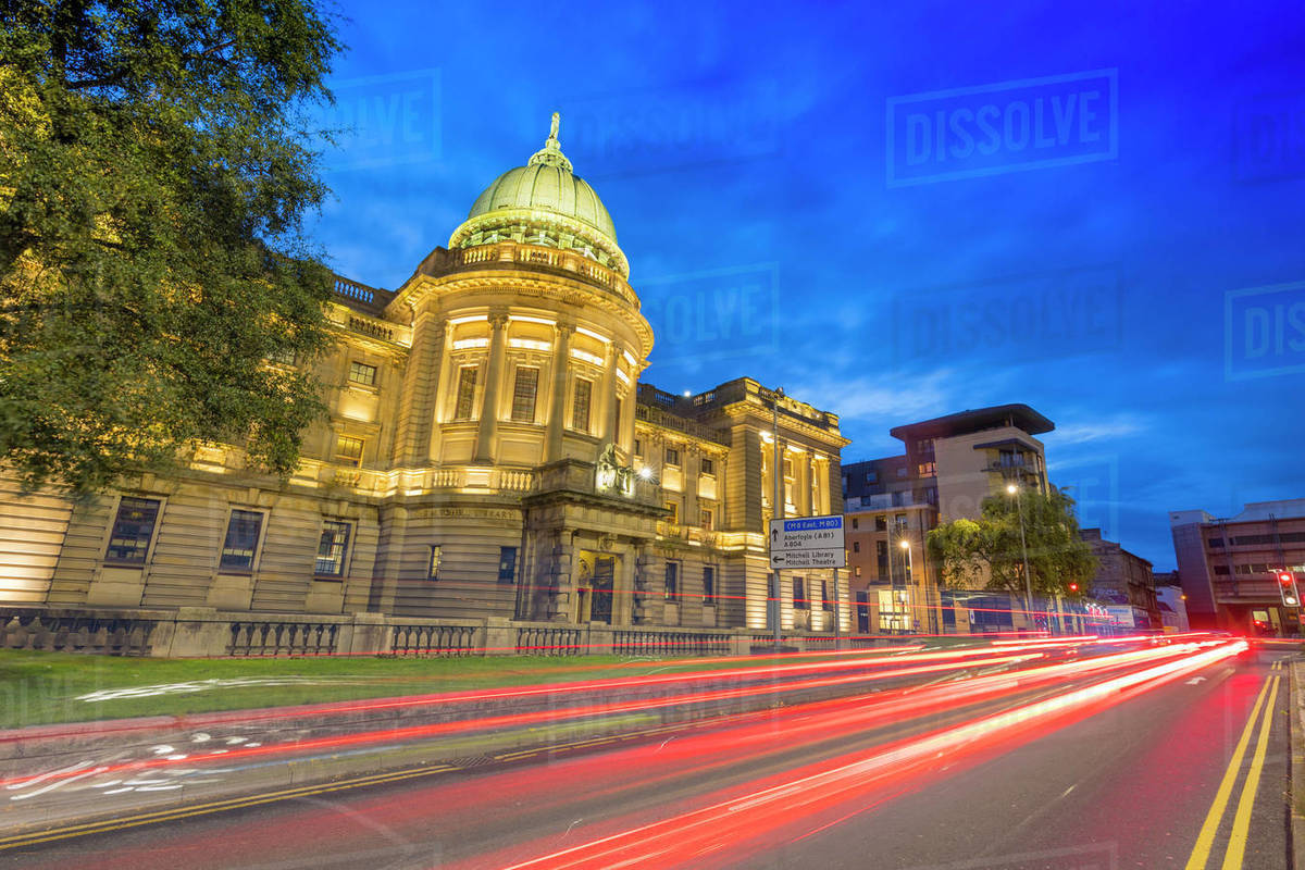 Mitchell Library with traffic trail lights at dusk, Glasgow, Scotland, United Kingdom, Europe Royalty-free stock photo