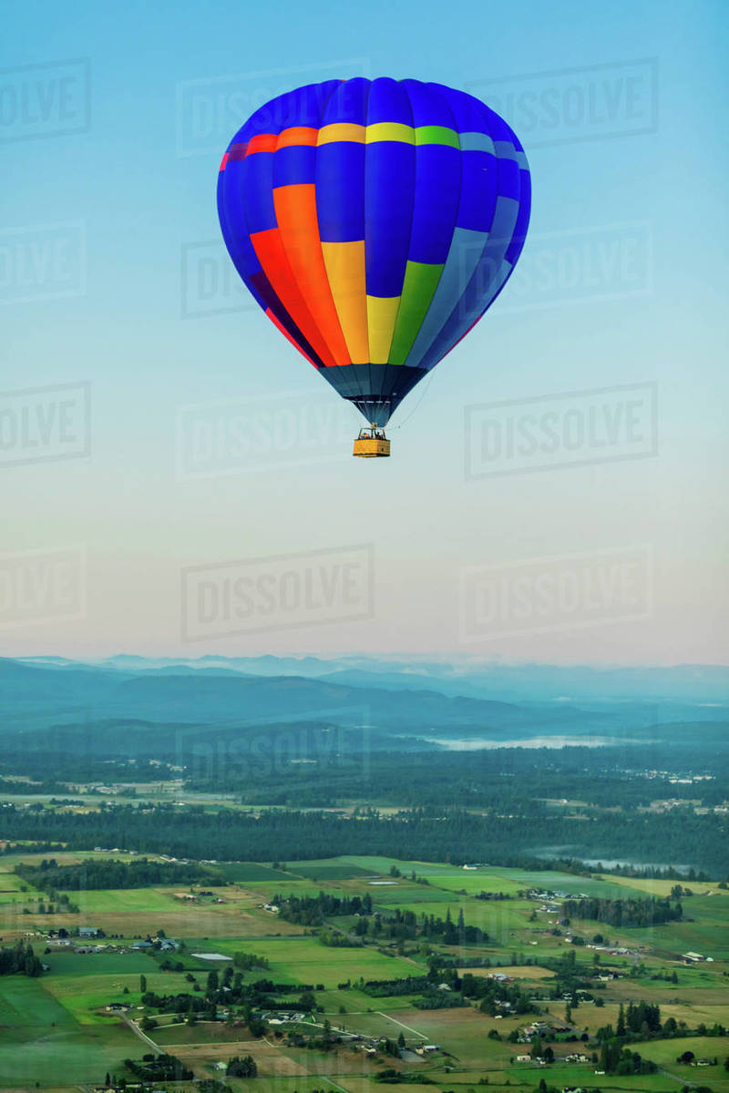 Hot air balloon over Auburns farmland, Washington State, United States