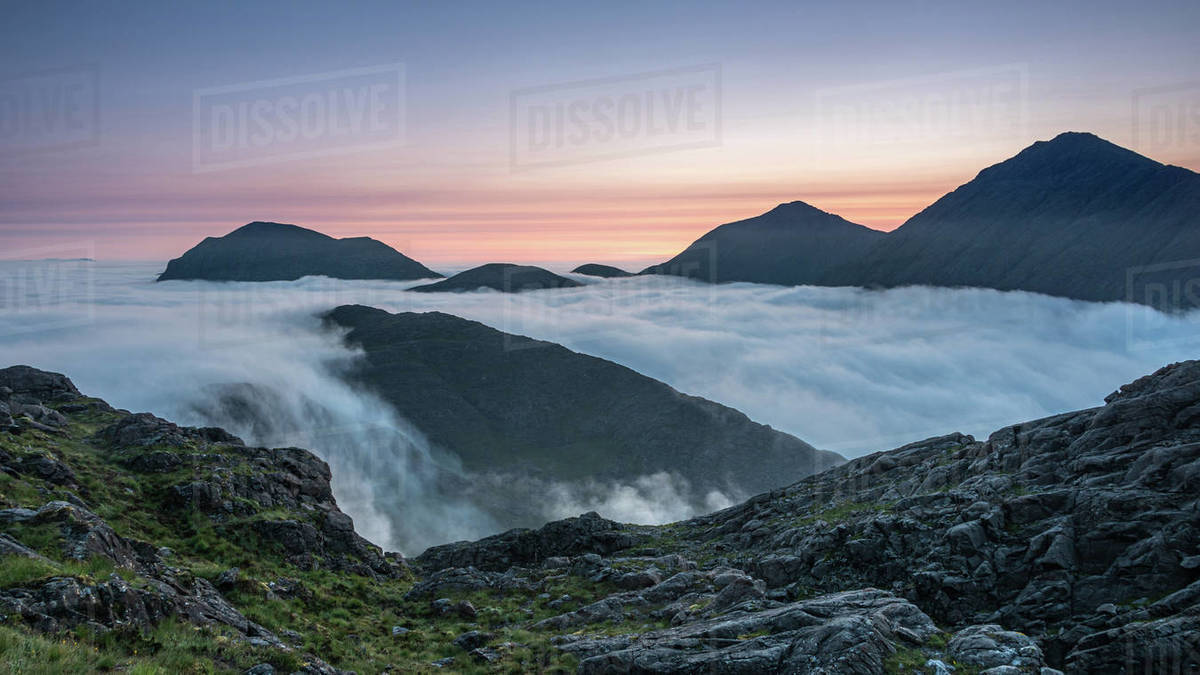 Sunrise behind Bla Bheinn and Marsco with an early morning inversion ...