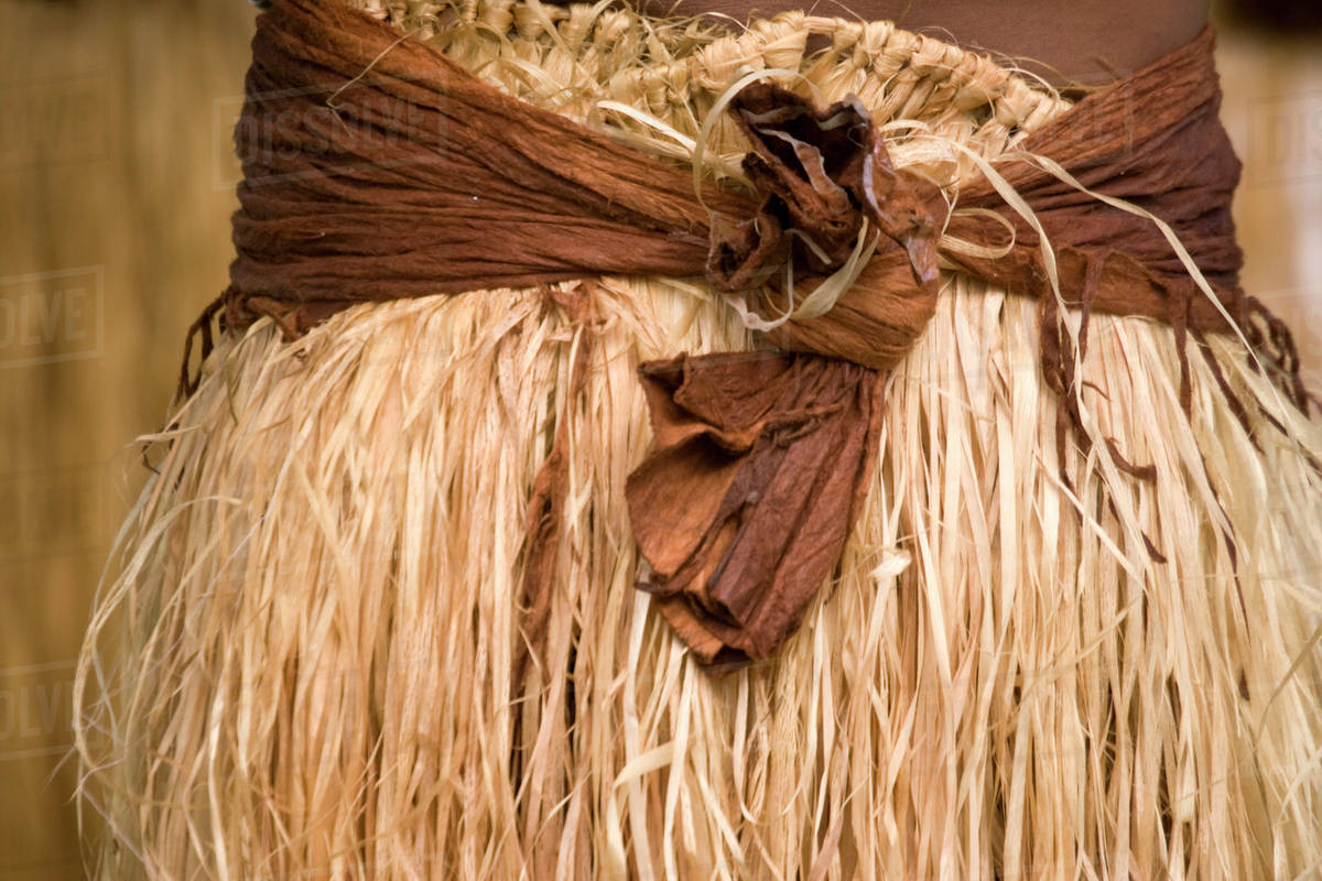 Fiji, Viti Levu, Viseise. Detail of a traditional grass skirt tied with