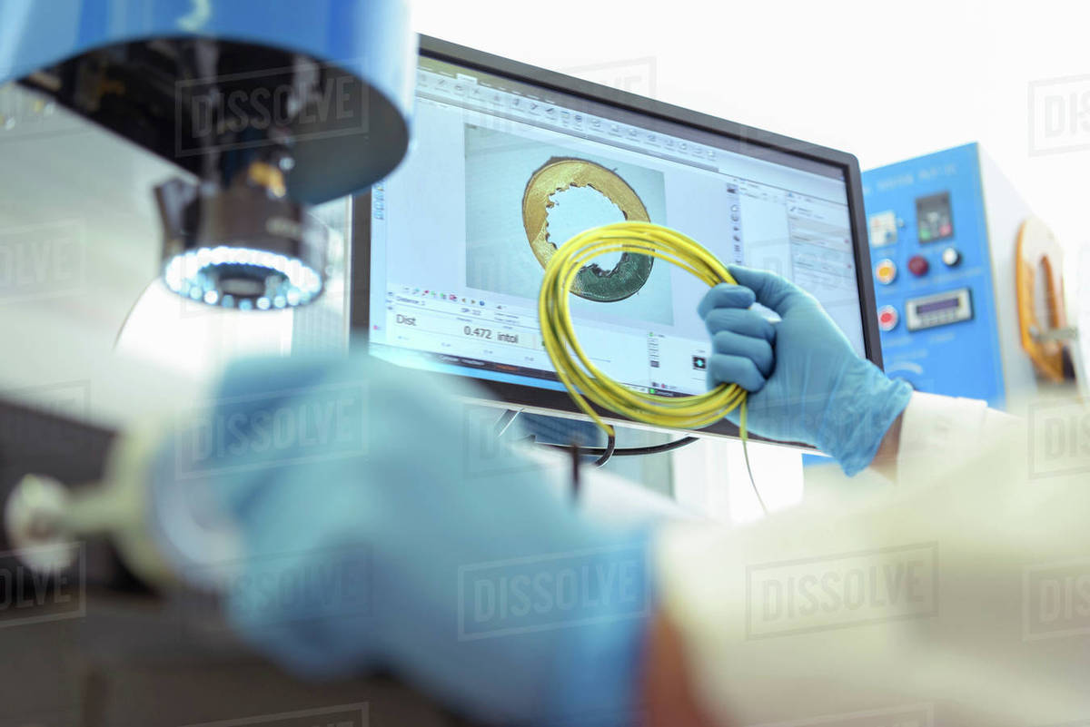 Scientist testing electrical cable in electrical cable laboratory