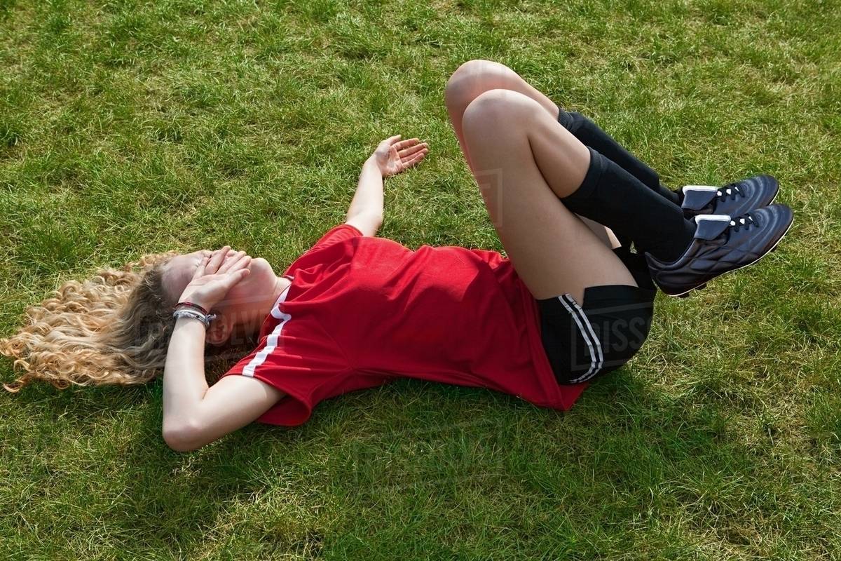 Girl soccer player with injury Stock Photo Dissolve