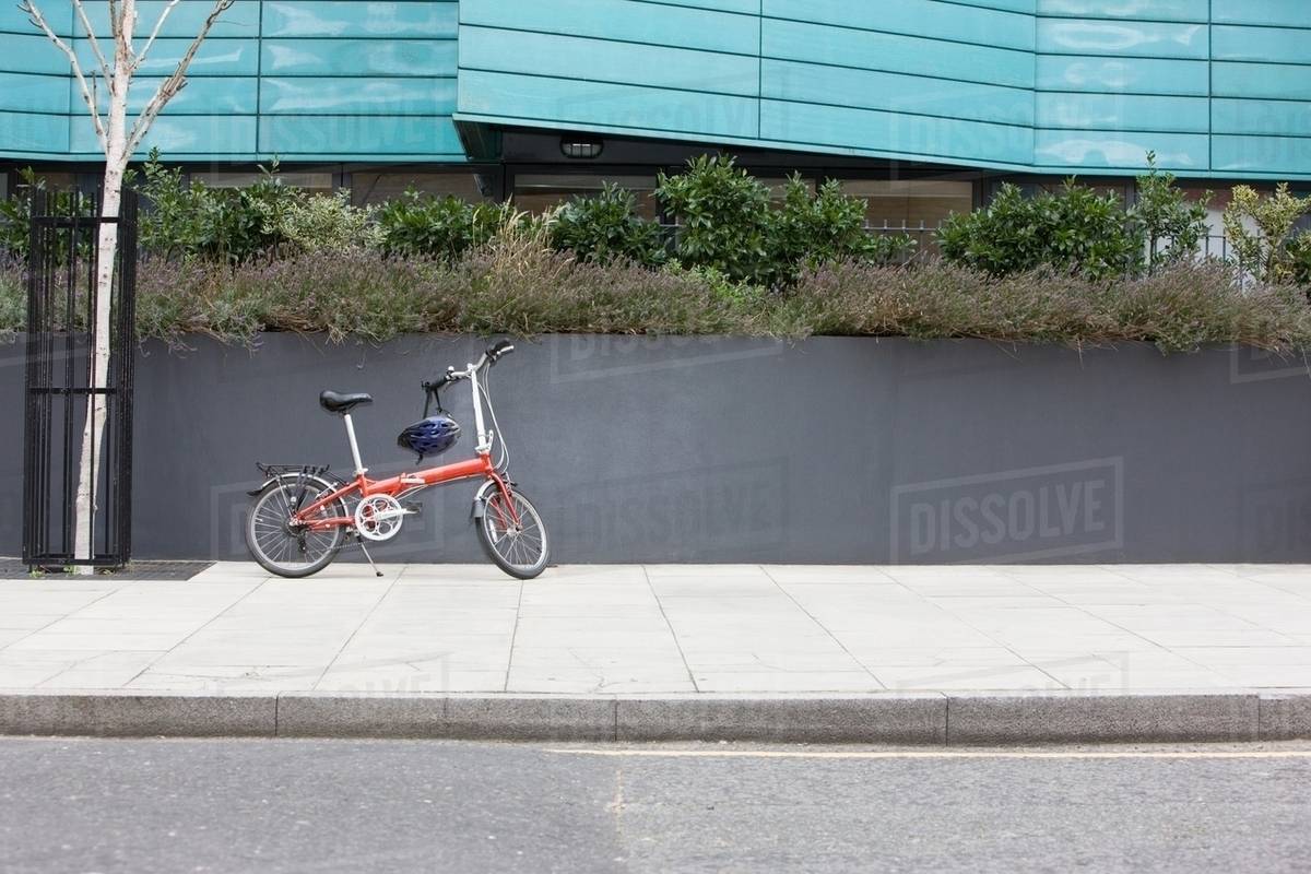 Bicycle on sidewalk Stock Photo Dissolve