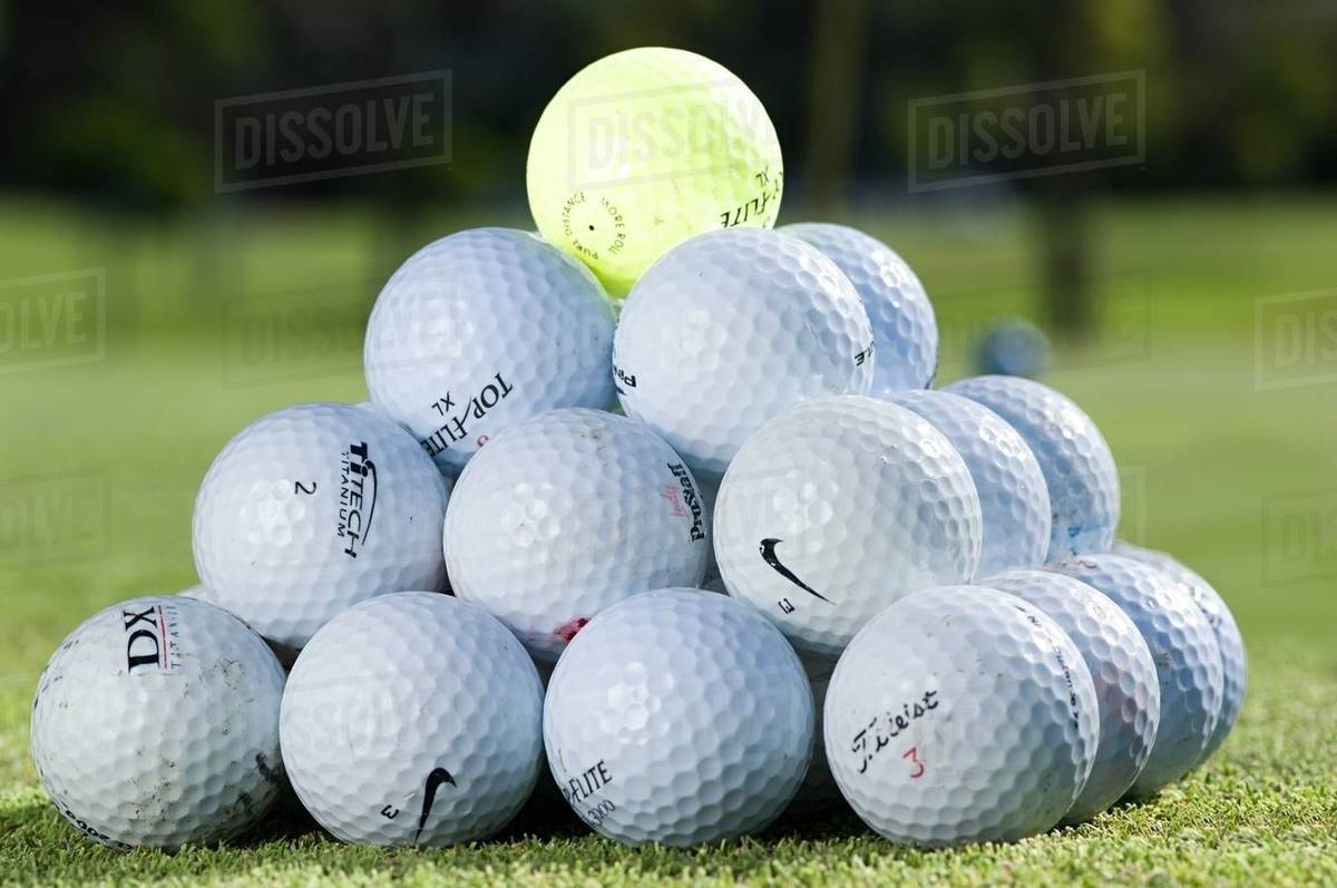 A stack of golf balls Stock Photo Dissolve