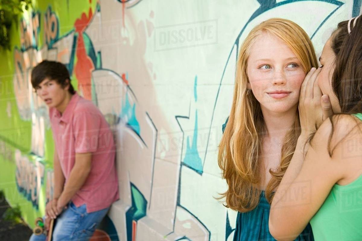 Teenage Girls Gossiping Stock Photo Dissolve