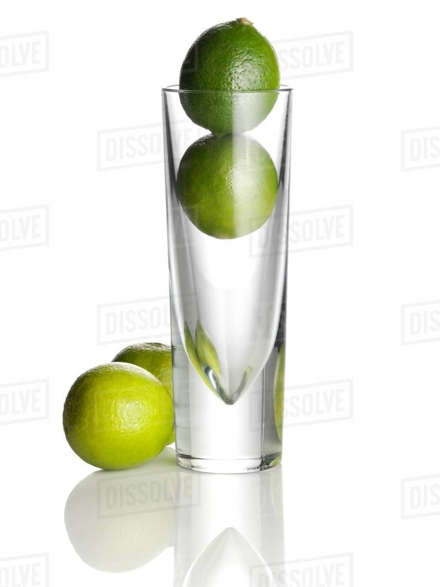 Limes in a glass Stock Photo Dissolve