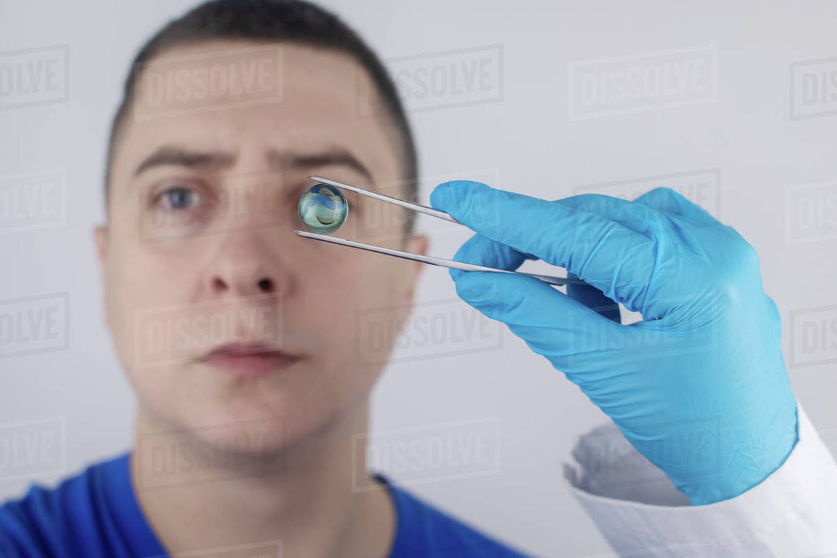 Conceptual shot of an eye crystalline lens replacement. Ophthalmic