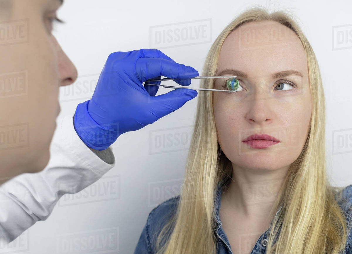 Conceptual shot of an eye crystalline lens replacement. Ophthalmic