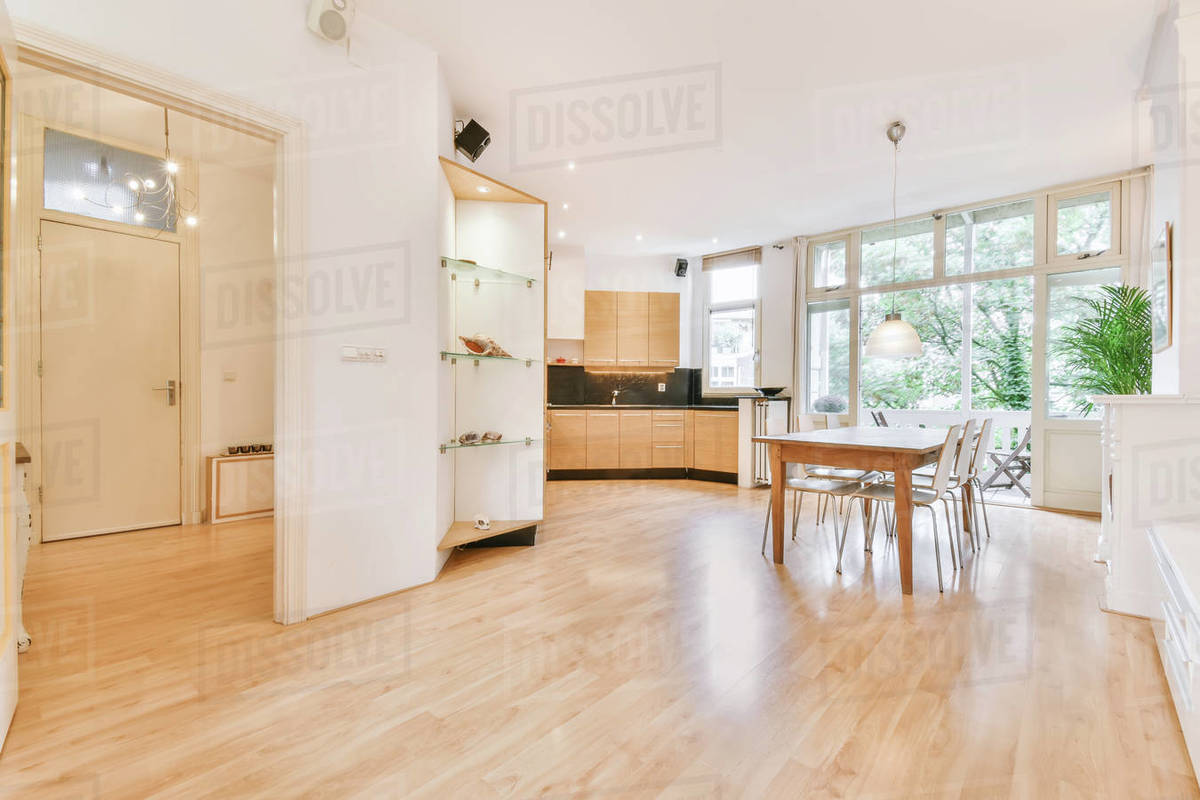 Home interior design of modern loft apartment with open kitchen in