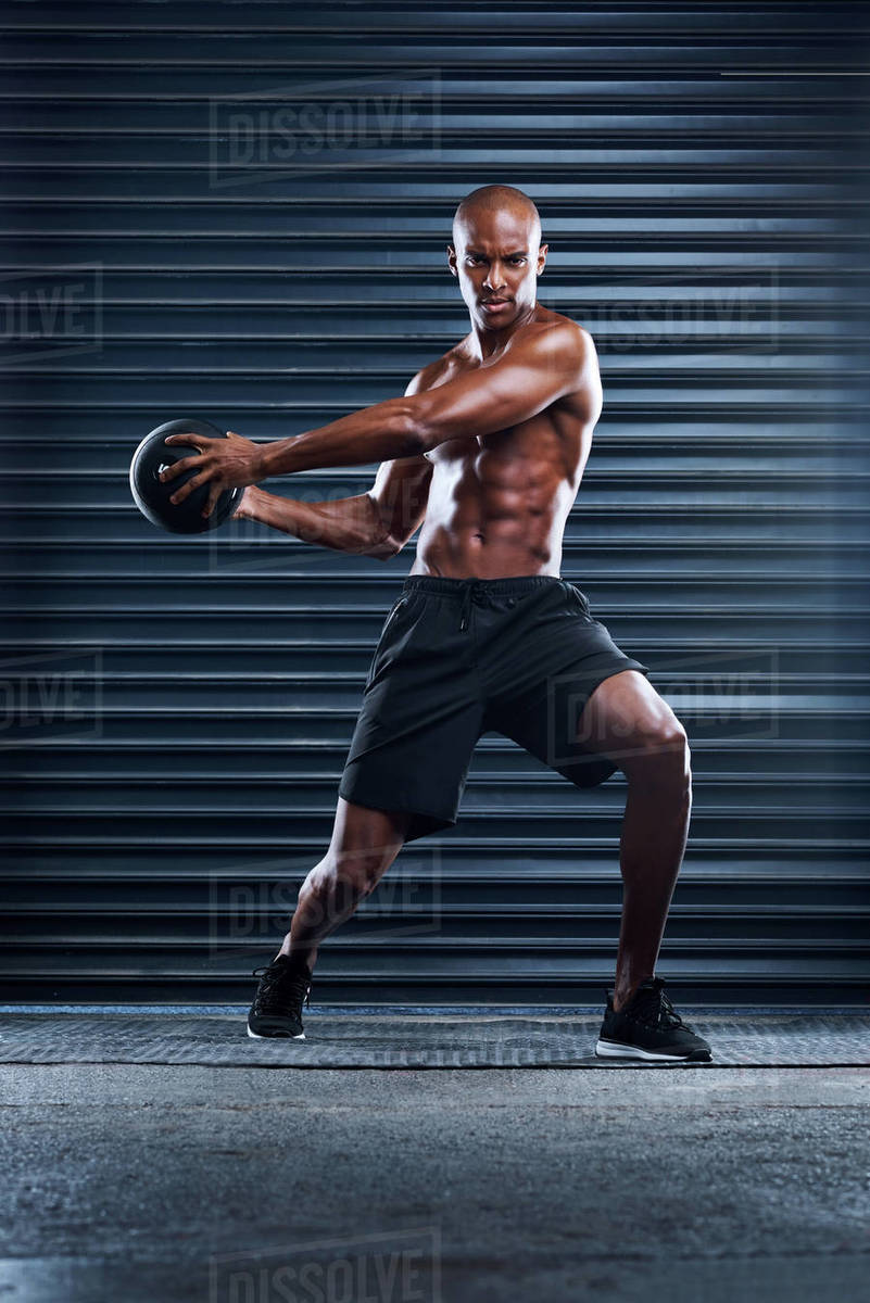 Fitness, portrait and man with medicine ball training for cardio
