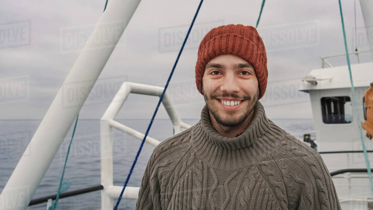 Portrait of Casualy Dressed Smiling Fisherman on Commercial Fishing