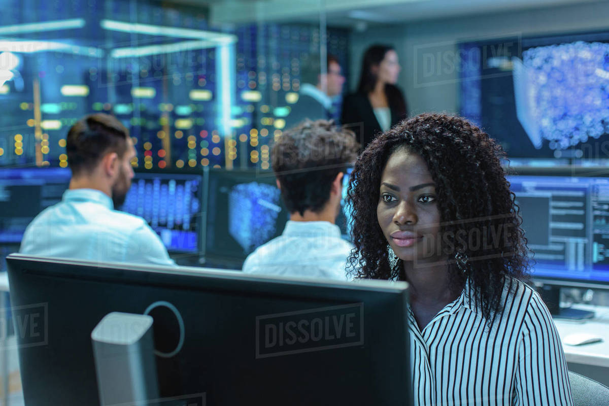 Female Computer Engineer Works on a Neural Network/ Artificial