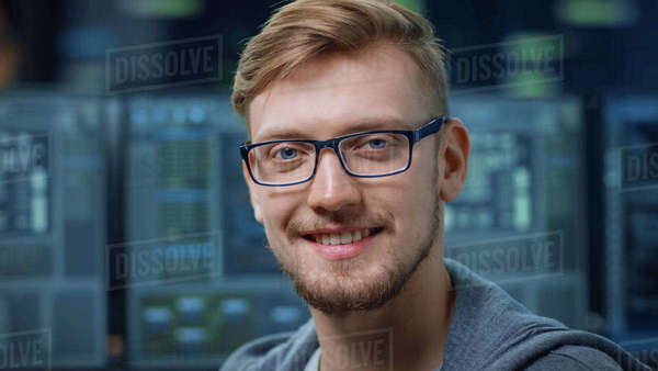 Portrait of a Smart and Handsome IT Specialist Wearing Glasses Smiles ...