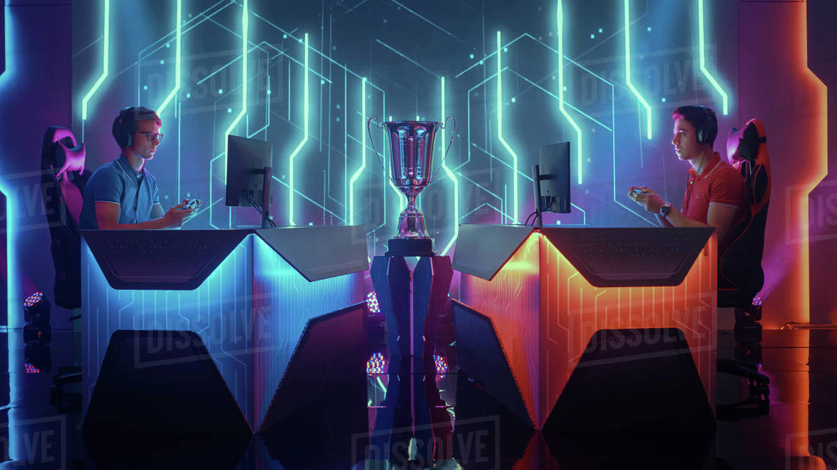 Two Professional Esport Gamers Using Controllers Playing Console Video