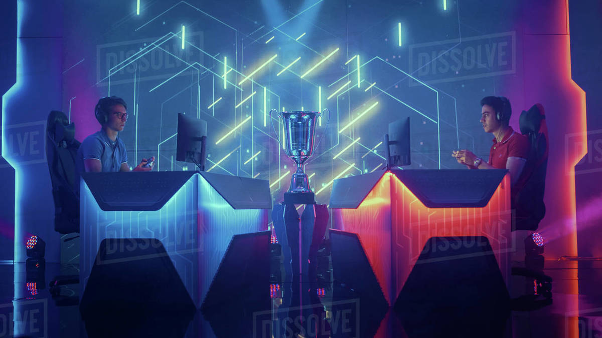 Two Professional Esport Gamers Using Controllers Playing Console Video