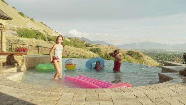 infinity pool united states panning timelapse medium shot of girls playing in swimming pool cedar hills utah medium sisters infinity utah infinity pool united states panning timelapse medium shot of girls playing in swimming pool cedar hills utah medium sisters infinity utah