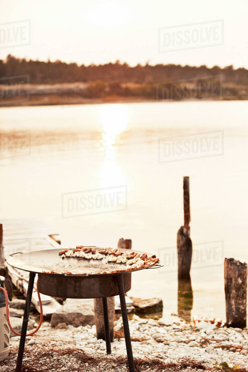 Barbecue at water Stock Photo Dissolve