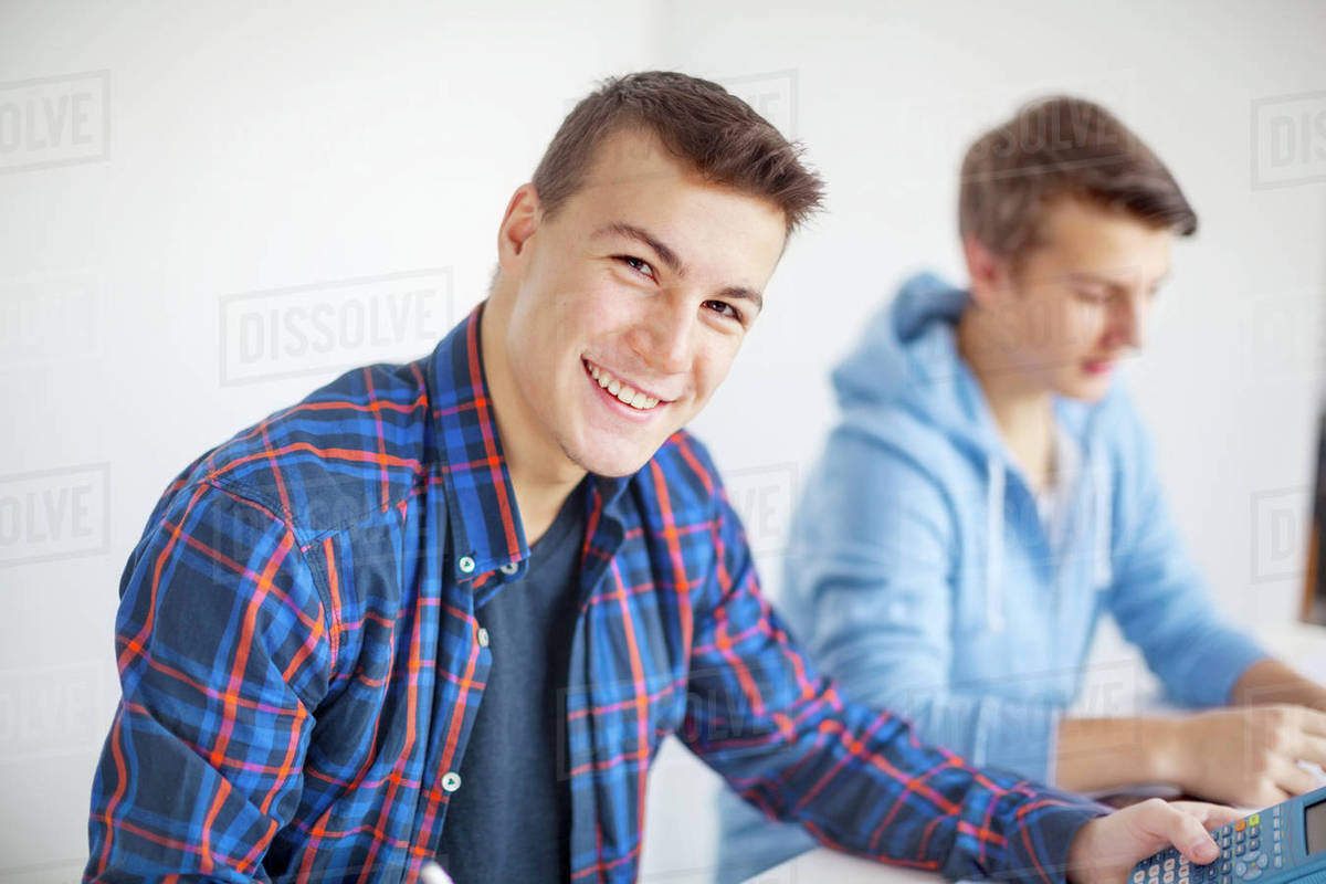 Teenage boys doing homework - Royalty-free Stock Photo | Dissolve
