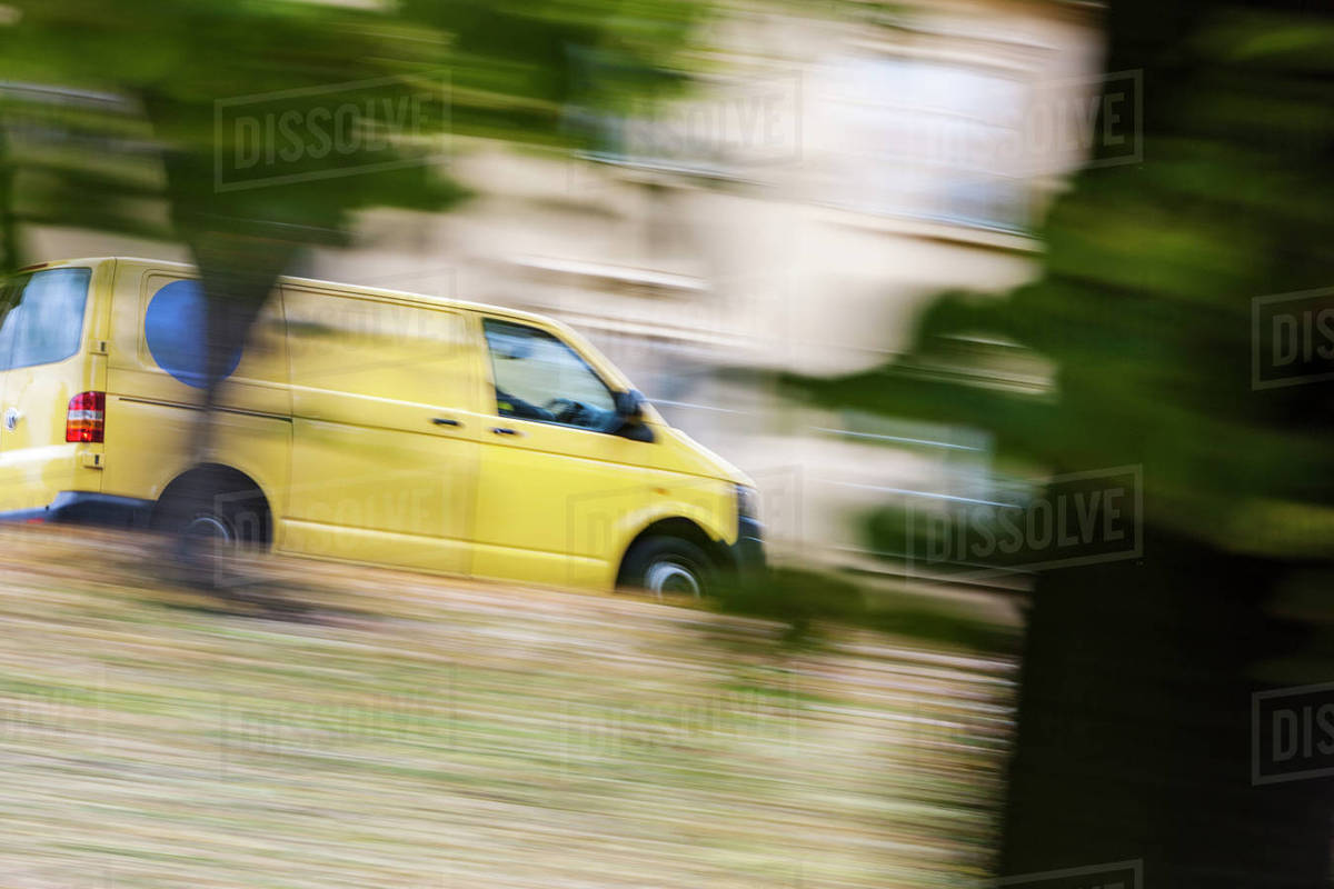 Yellow van Stock Photo Dissolve