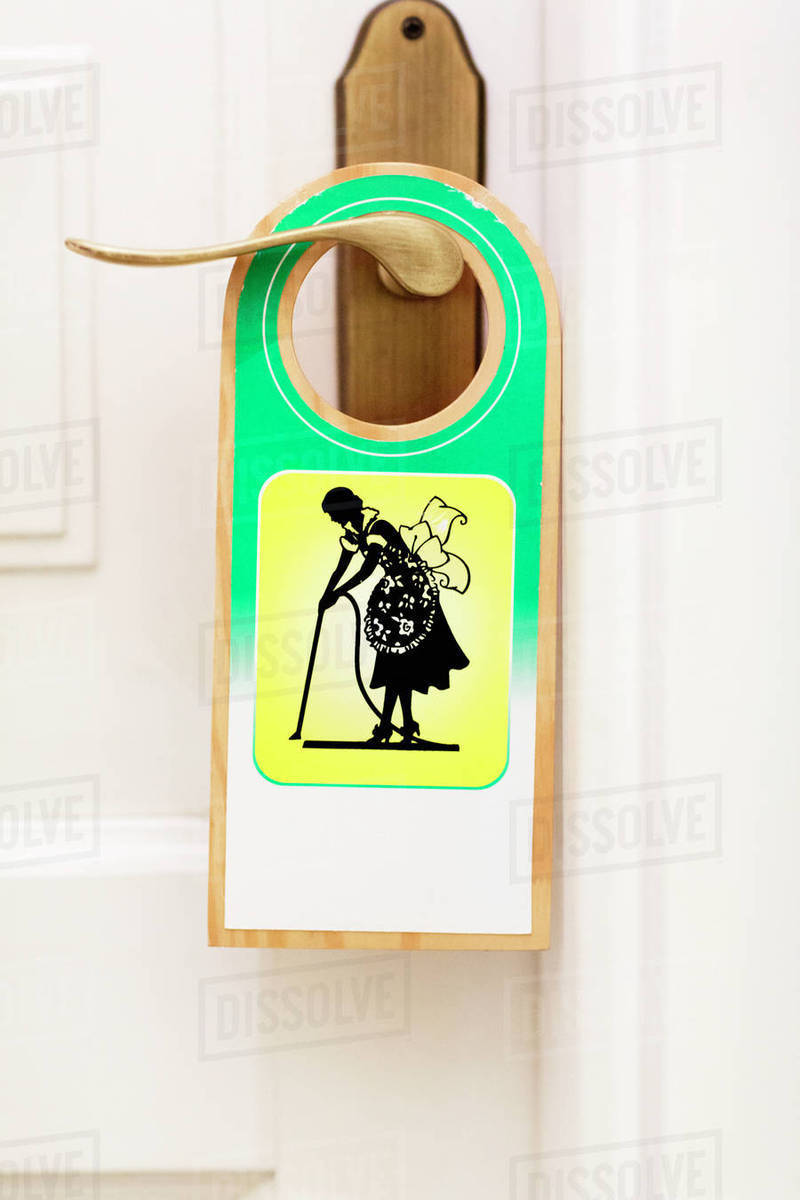 Cleaning sign on door - Stock Photo - Dissolve