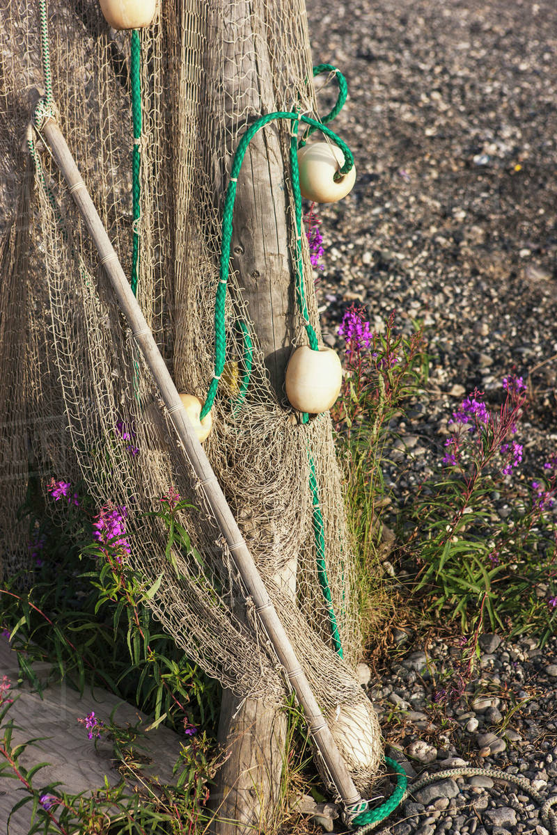 Fishing nets hanging to dry along the banks of the Noatak River, with