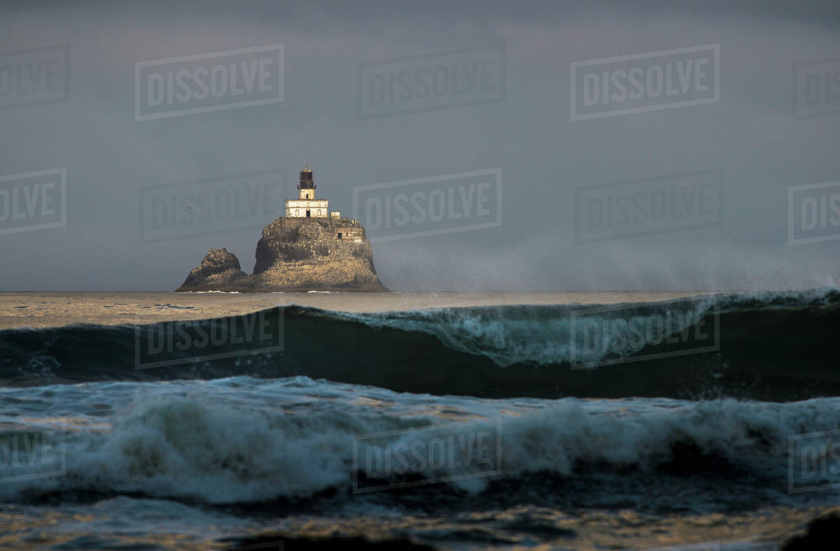 Early Sunlight Illuminates The Old Tillamook Rock Lighthouse Cannon Early Sunlight Illuminates The Old Tillamook Rock Lighthouse Cannon Beach Oregon United States Of America