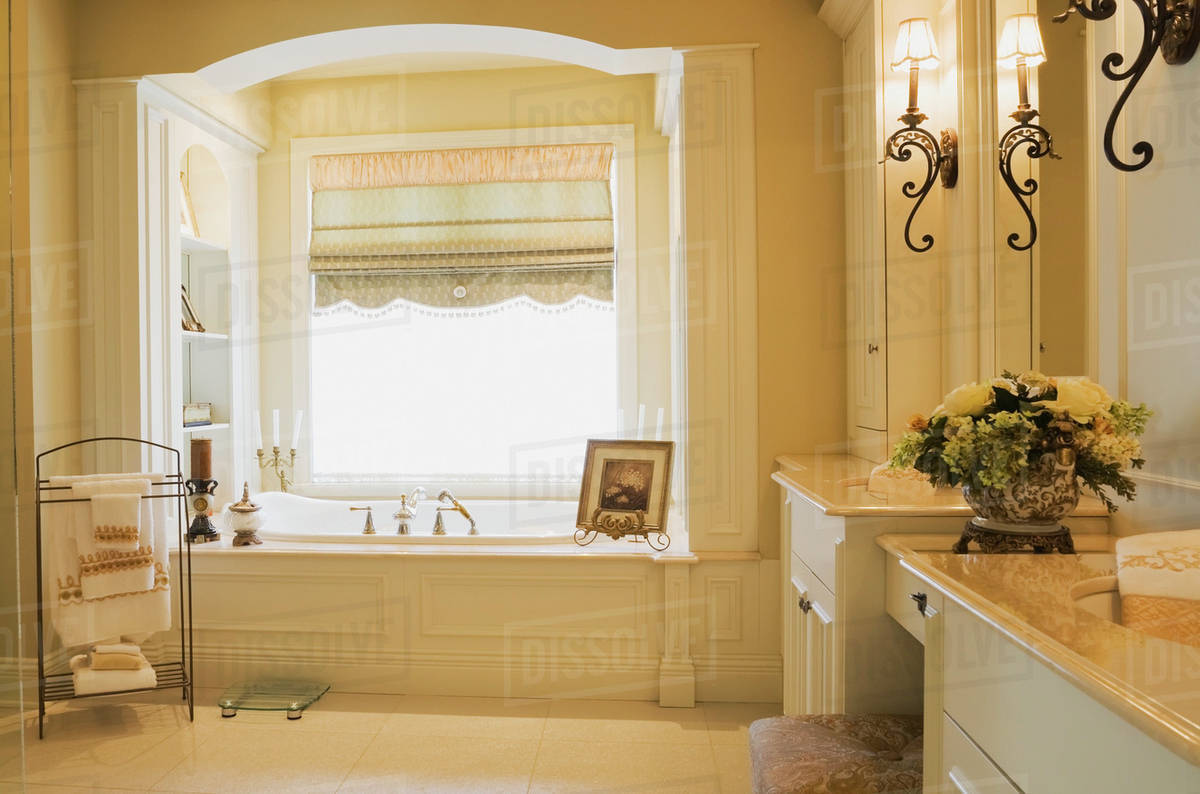 Modern Bathroom With White Wooden Vanity Units Inside A Lavishly Modern Bathroom With White Wooden Vanity Units Inside A Lavishly Decorated And Luxurious Cottage Style Residential Home Quebec Canada